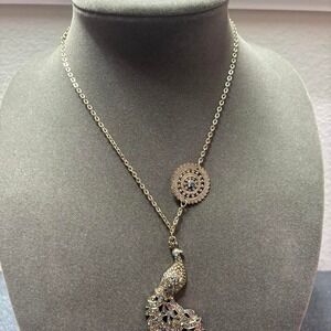 Silver and multicolored stone peacock pendant necklace Icing Brand